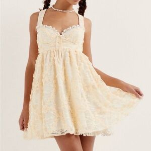 For love and lemons mini dress in cream.